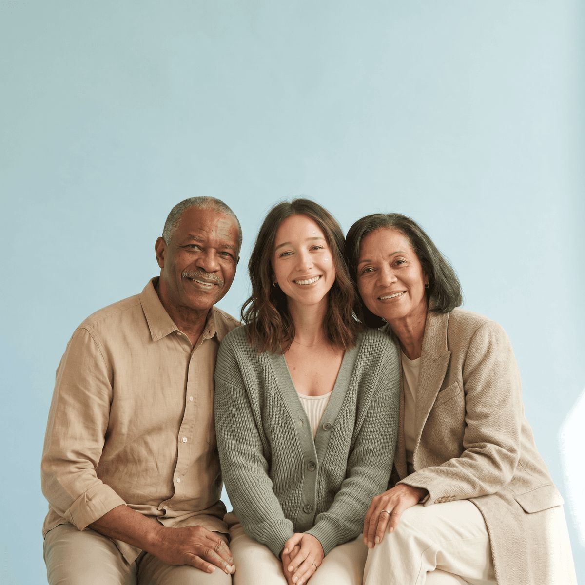A family at home, looking at each other while one holds a phone